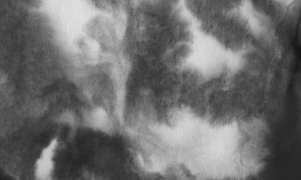 istock black abstract watercolor grunge background. blur paint on white paper. Simple primitive background, the basis for decoration 1275862279