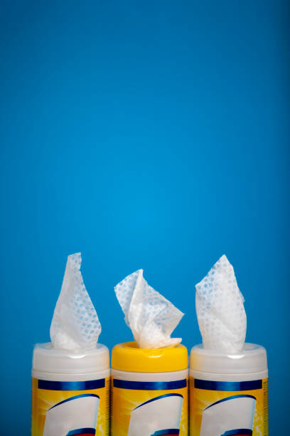 istock sanitation wipes cleanser background blue yellow 1275863497