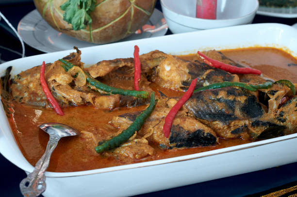 istock Spicy Curry fish, Traditional Asian cuisine 1275865157