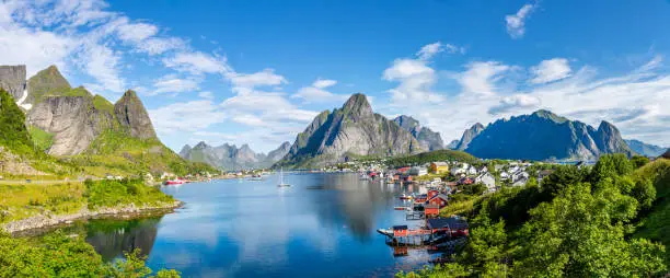 This image shows beautiful day time view of Reine Village, Lofoten Islands, Norway