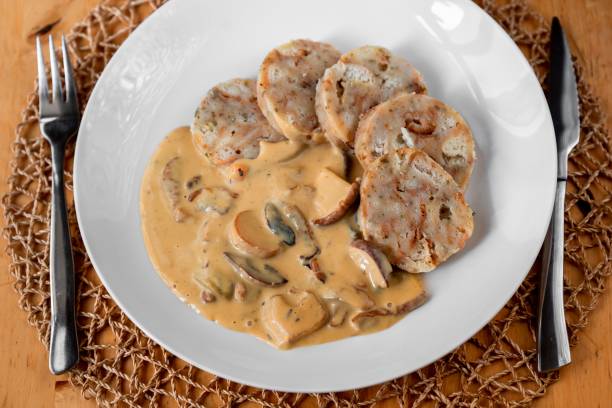 istock Creamy mushroom sauce with dumpling. 1275865286