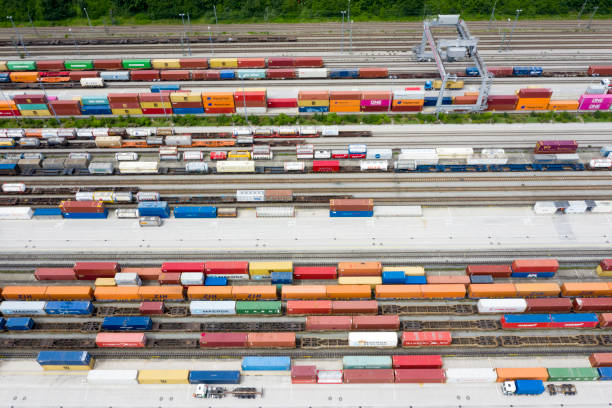 istock Aerial View of Cargo Containers and Freight Trains 1275866218
