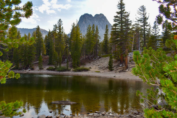 istock Beautiful mountain landscape reflecting in alpine lake 1275867055
