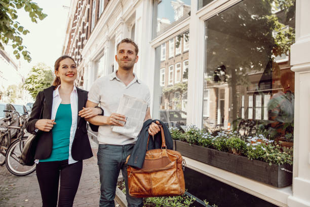 istock Beautiful couple walking in Amsterdam 1275867192