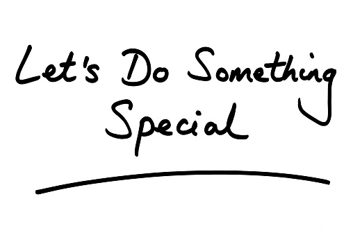 Lets Do Something Special handwritten on a white background.