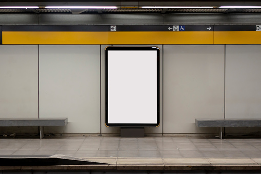 Blank billboard mock up in a subway station, underground