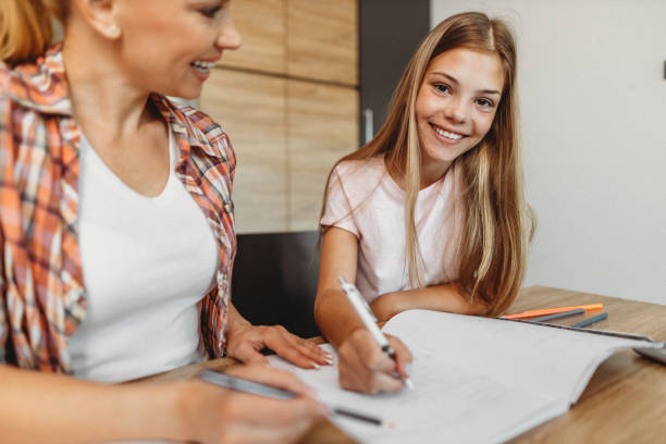 istock Happy girl studying 1275869106