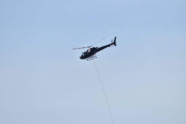 istock Helicopter is doing some transportation in Disentis in Switzerland 8.5.2020 1275874462