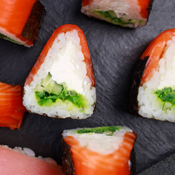 istock Seafood delicatessen salmon sushi rolls on plate 1275876225