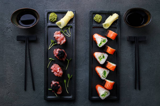 Seafood delicatessen sushi rolls set on plates