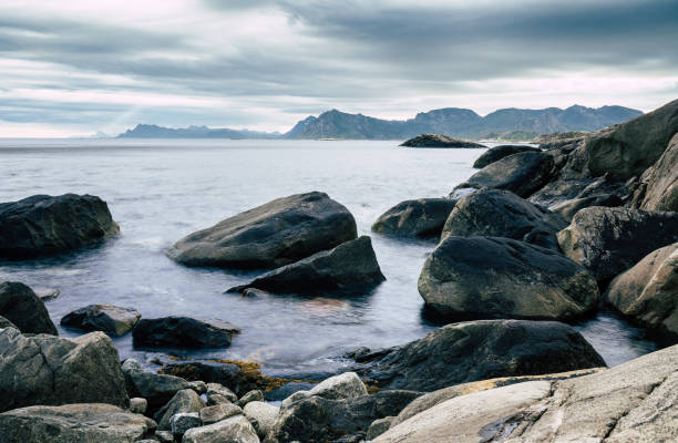 istock Waves on Rocky sea shore. 1275882396