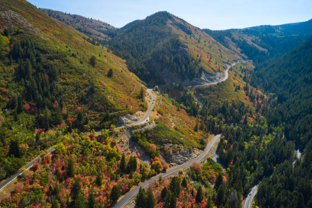 Salt Lake City, United States – September 26, 2007: Landscape of Salt Lake City outskirts with mountains, cars and former Cottonwood Mall