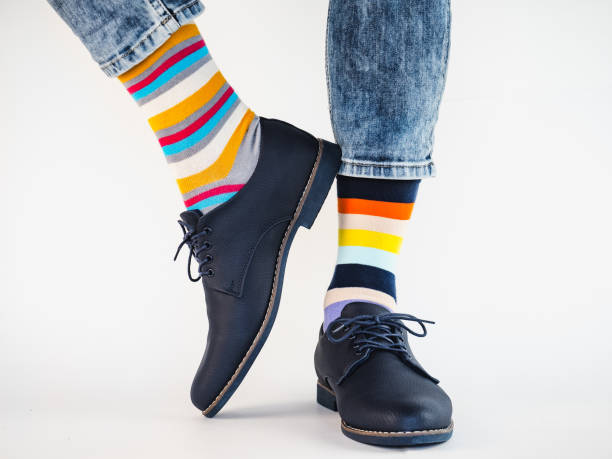 istock Men's legs, trendy shoes and bright socks 1275922603