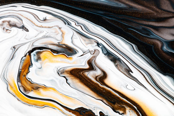 istock Fluid art texture. Abstract background with iridescent paint effect. Liquid acrylic picture that flows and splashes. Mixed paints for interior poster. Golden, black and white overflowing colors. 1275929629