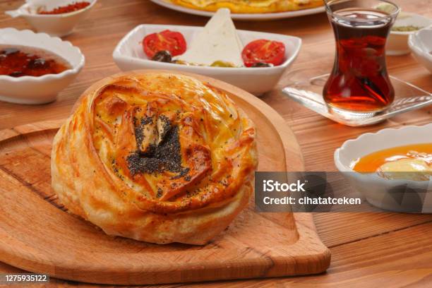 Turkish Pastry Pogaca With Tea Tea On Wooden Surface Traditional Oven Haz Stock Photo - Download Image Now