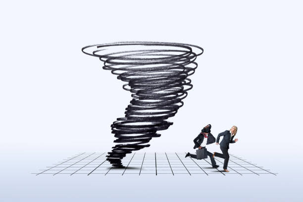 Businesswoman And Businessman Running Away From Swirling Tornado A businesswoman and a businessman run away from the chaos that is a swirling tornado above them. avoidance stock pictures, royalty-free photos & images