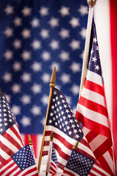istock American Flag flies freely over America. 1275958074