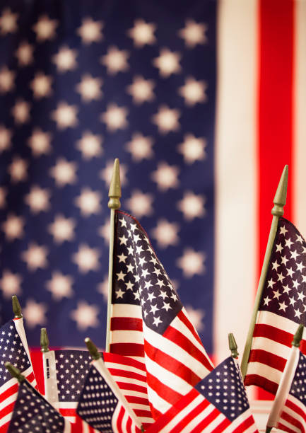 istock American Flag flies freely over America. 1275959359