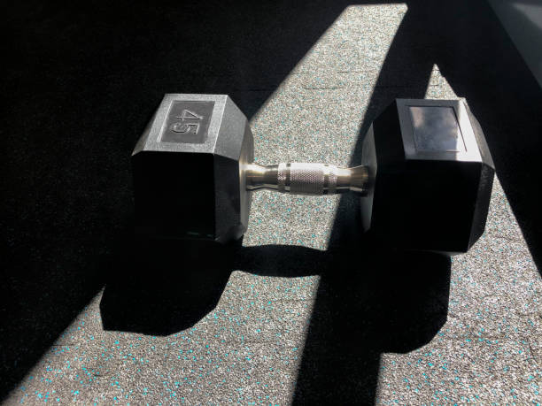 istock Dumbell on gym's floor 1275971669