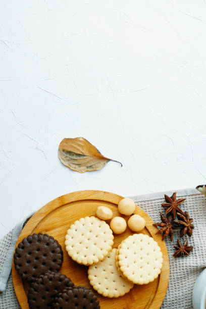 istock Cookies and candy on wooden tray. 1276036278