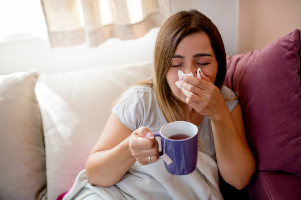 istock Woman caught cold , flu, running nose 1276054343
