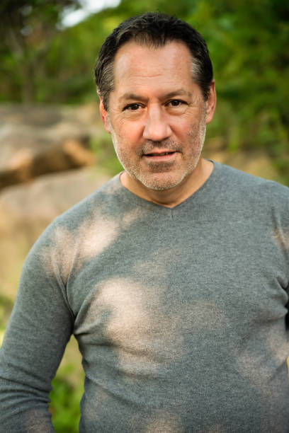 istock Mature man outdoors portrait in summer nature. 1276057073