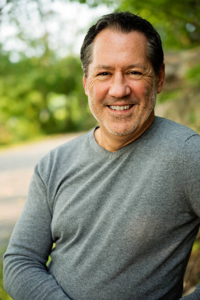 istock Mature man outdoors portrait in summer nature. 1276057093