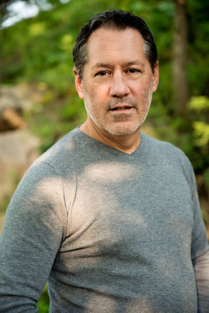 istock Mature man outdoors portrait in summer nature. 1276057639