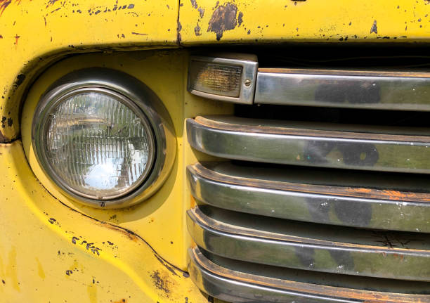 istock Vintage Yellow Truck Front Grille (Close-Up) 1276133996