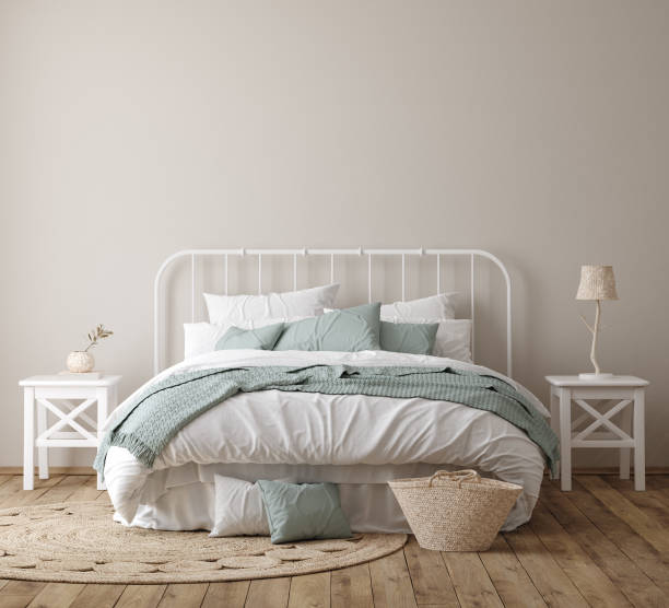 istock Light farmhouse bedroom interior with blank wall 1276165872
