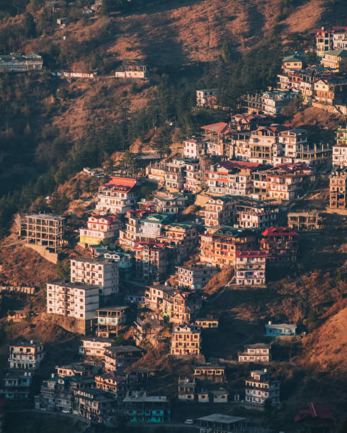 Shimla village high angle view at Sunset, houses at the foothills of the Himalayas, Himachal Pradesh Shimla village high angle view at Sunset, houses at the foothills of the Himalayas, Himachal Pradesh in Shimla, HP, India shimla stock pictures, royalty-free photos & images