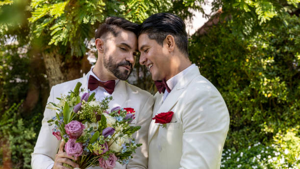 istock Gay wedding in a garden 1276249741