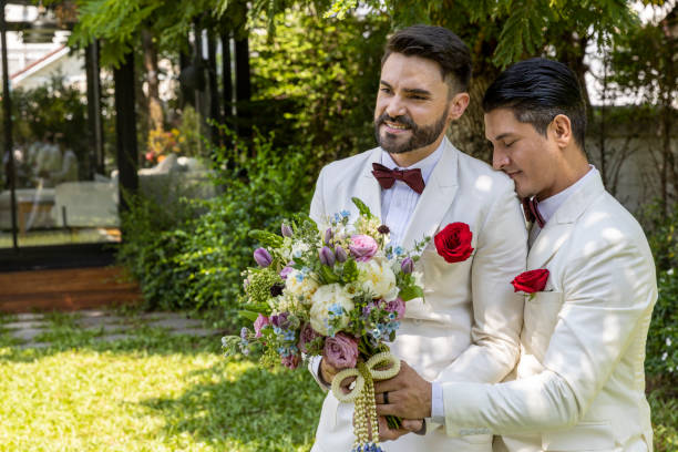 istock Gay wedding in a garden 1276249747