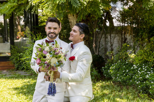 istock Gay wedding in a garden 1276249755