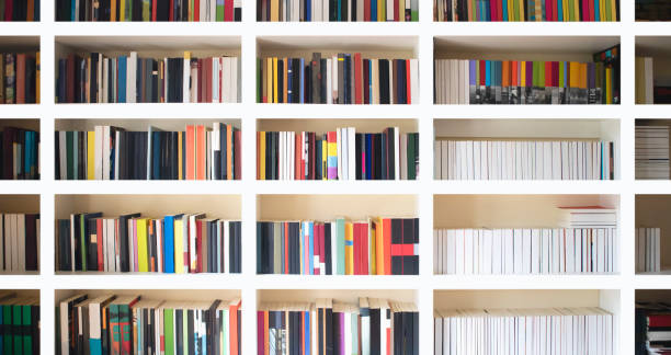 istock Home library wall. Clean and modern decoration. Organized neat bookshelf room. 1276295698