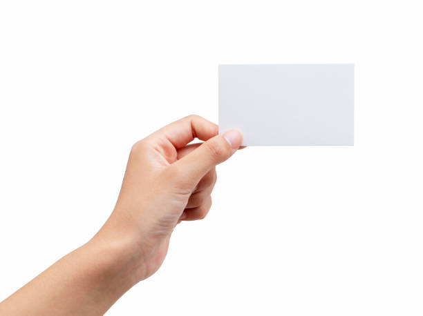 istock A woman's hand holding a plain business card on a white background 1276312845