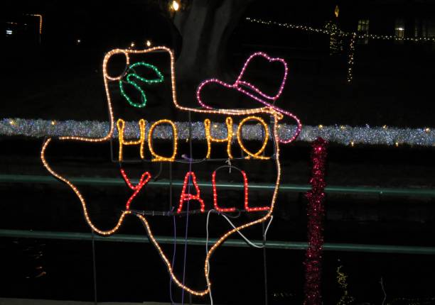 Granbury, Texas, USA – December 26, 2019: Granbury City Park is decked out in Old Wild West light displays for the Christmas holiday. \