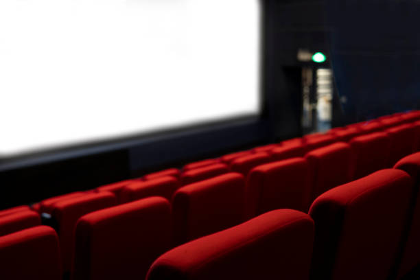 istock Empty comfortable red seats with numbers in cinema 1276351093