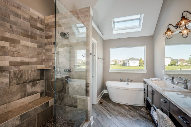 istock Gorgeous bathroom with bench in large walk-in shower 1276355292