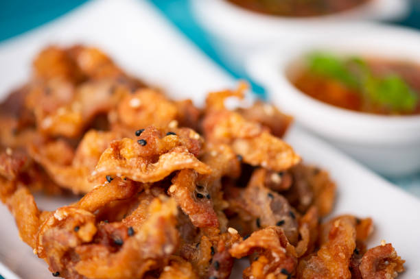istock Crispy fried sliced belly pork with spicy sauce 1276358112
