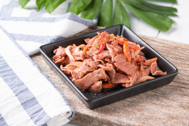 istock Stir fried pork with Pickled bean curd sauce and onion 1276358189