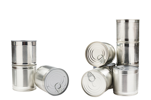 Group of silver canned food on white background.