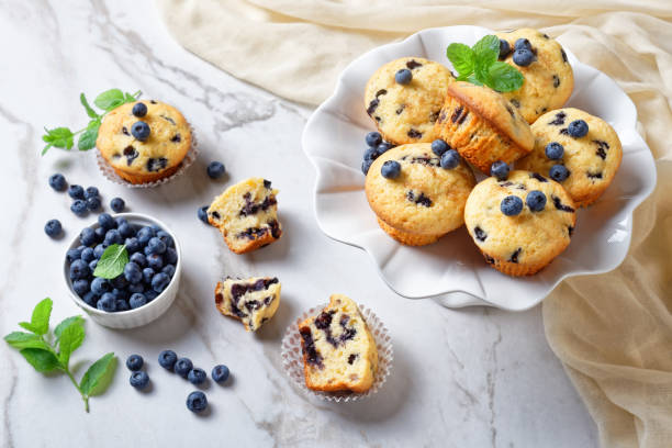 istock Blueberry muffins baked with fresh blueberries 1276370176