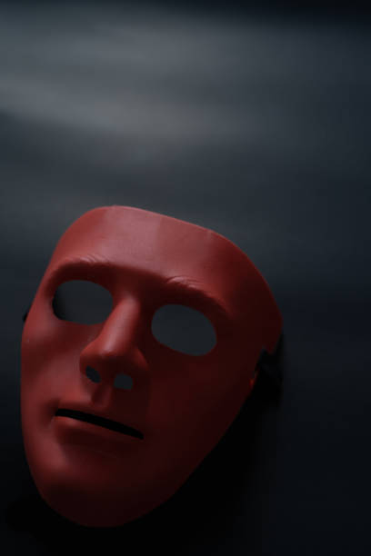 istock Halloween house decorations, red mask on a black background. 1276383091