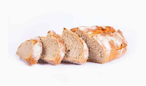 istock Sliced bread isolated on white background. Rustic crunchy bread , tasty and natural. 1276386458