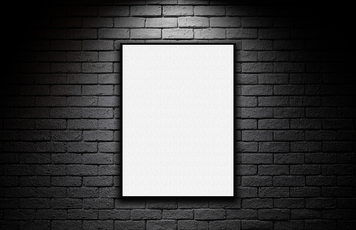 Blank advertising billboard on the dark brick wall background