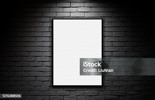 istock Blank advertising billboard on the dark brick wall background 1276388506