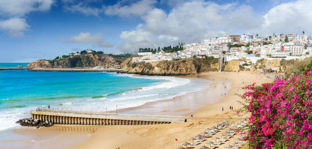 istock Landscape with old town Albufeira and sandy city beaches 1276388807