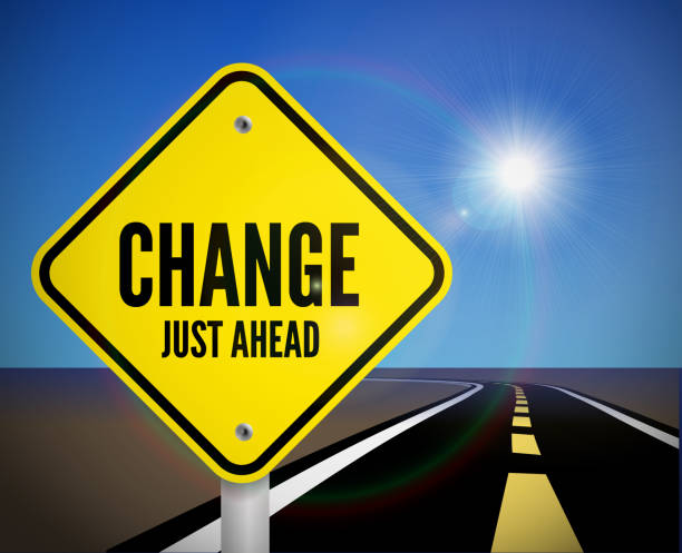 istock Change just ahead road sign on the road with sky and sun over the horizon. Vector 1276389343