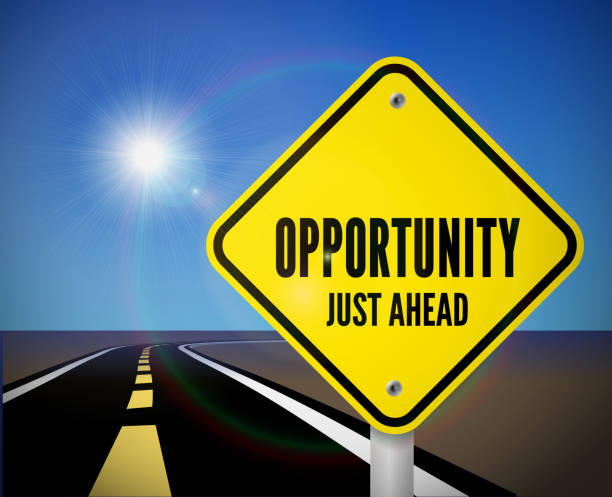 istock Opportunity just ahead road sign on the road with sky and sun over the horizon. Vector 1276389344